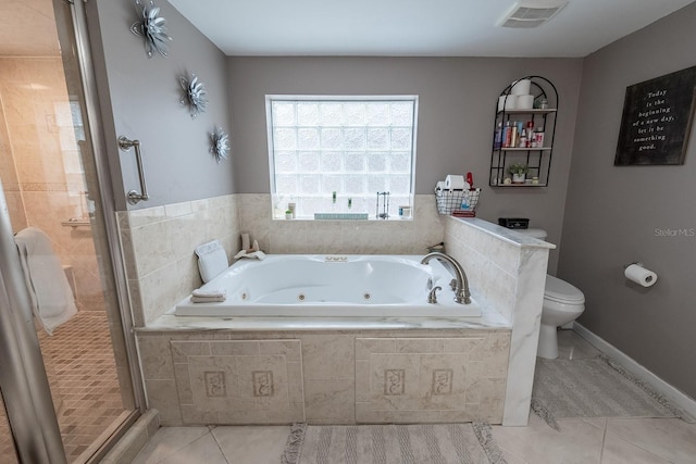 bathroom with toilet, tile patterned flooring, and shower with separate bathtub