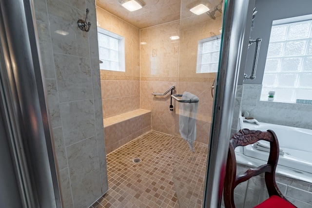 bathroom with tiled shower