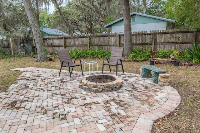 view of patio featuring a fire pit