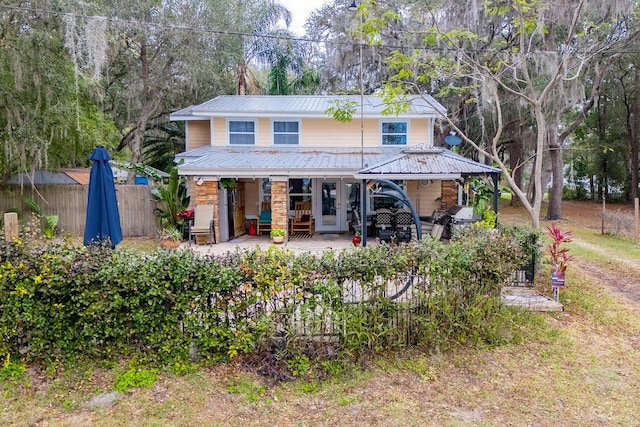 rear view of house with a gazebo