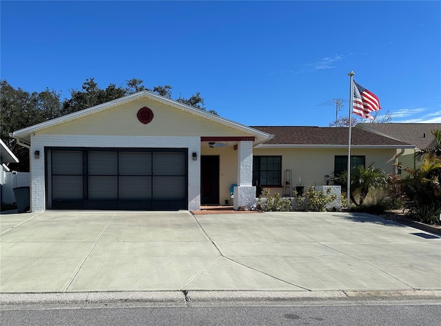 single story home with a garage