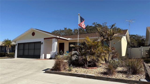 ranch-style home with a garage