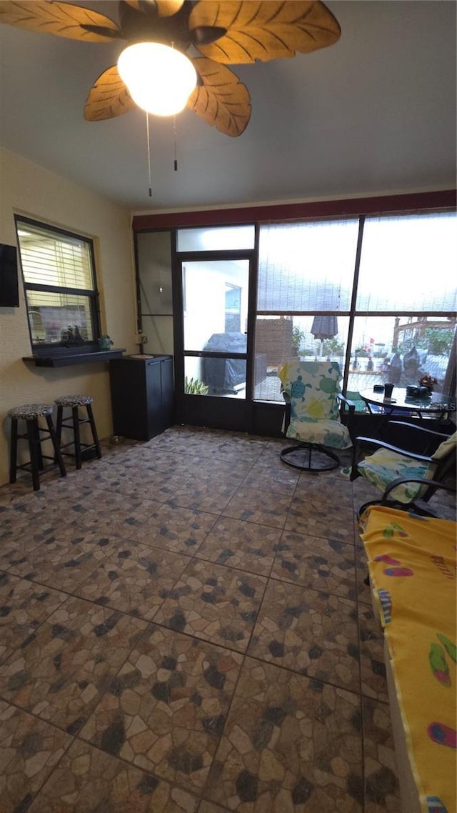 living room featuring ceiling fan