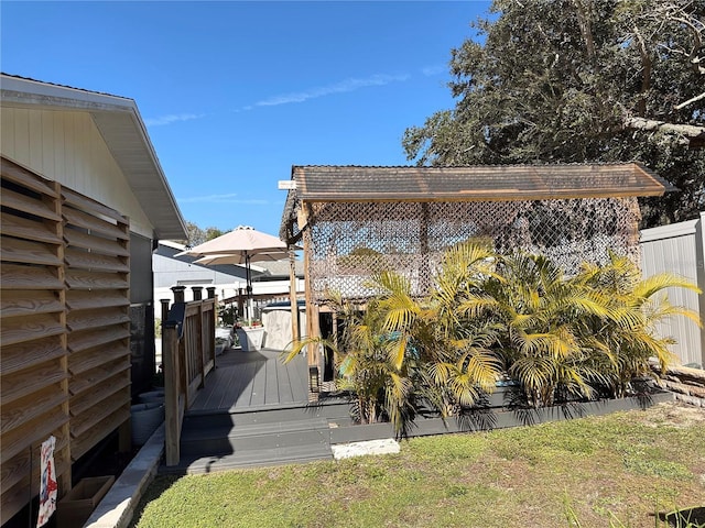 view of yard with a deck