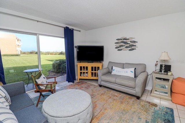 living room with tile patterned floors