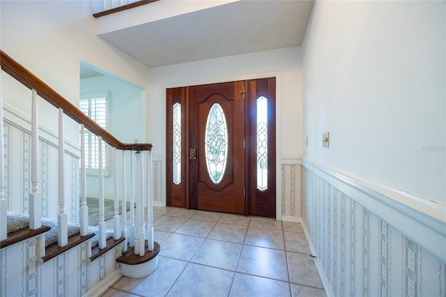 view of tiled foyer entrance