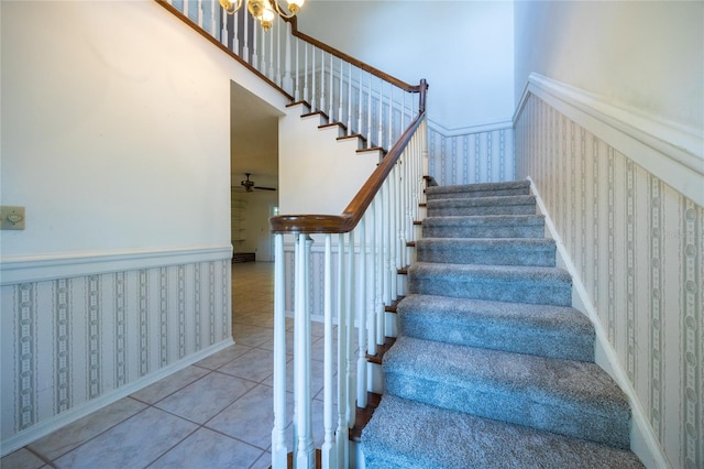 stairway with tile patterned flooring