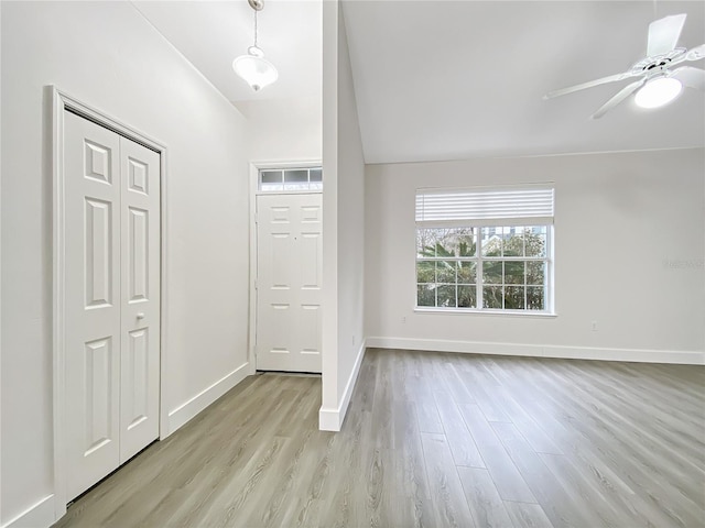 entryway featuring ceiling fan and light wood-type flooring