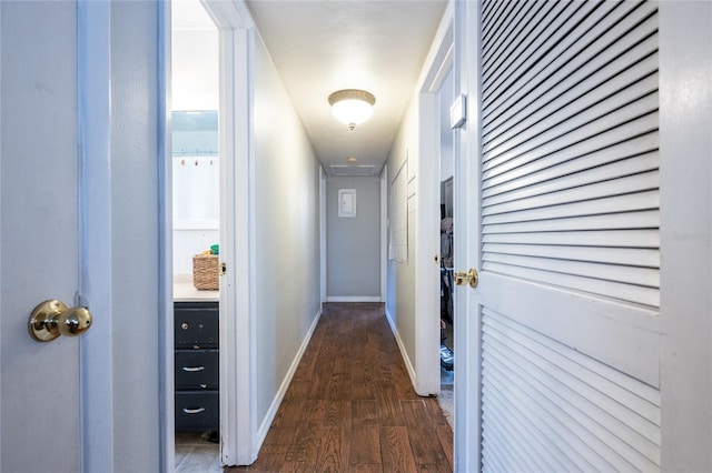 hallway featuring dark wood-type flooring