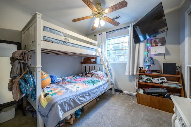 bedroom with ceiling fan and carpet flooring