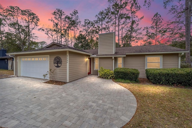 view of front of home featuring a garage