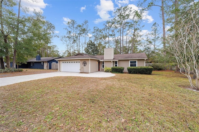 ranch-style home featuring a front lawn and a garage