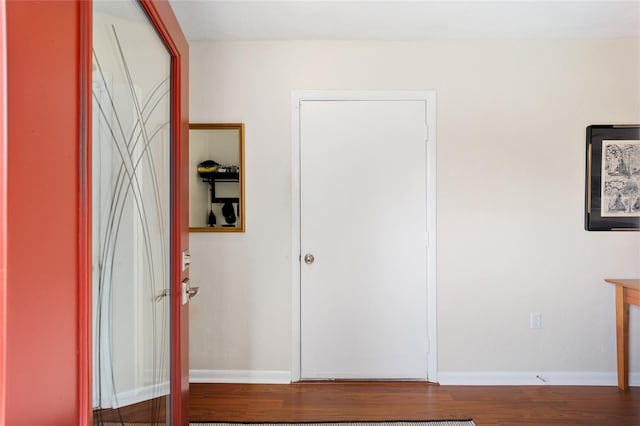 interior space with hardwood / wood-style flooring