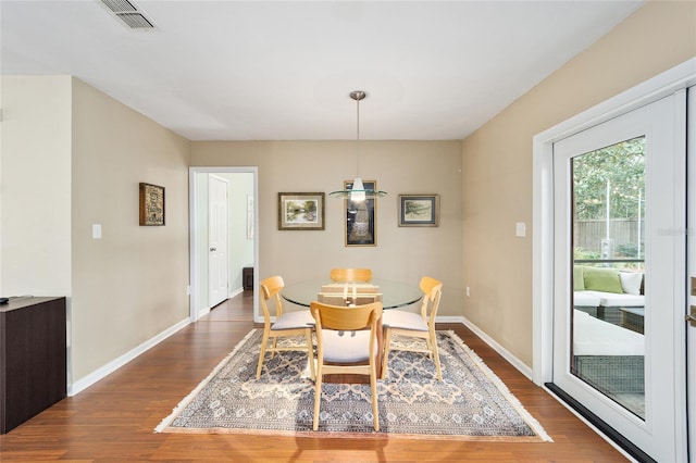 dining room featuring dark hardwood / wood-style floors