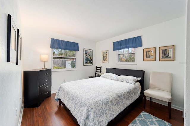 bedroom featuring dark hardwood / wood-style floors