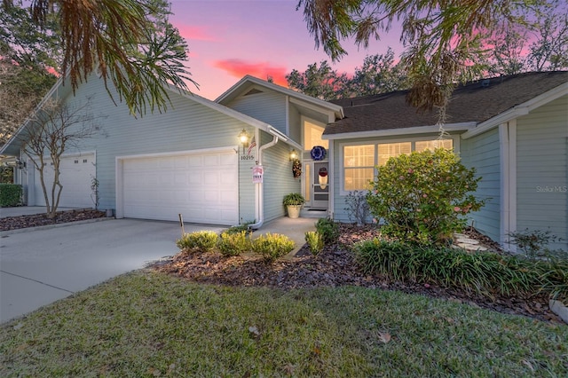 ranch-style home featuring a garage