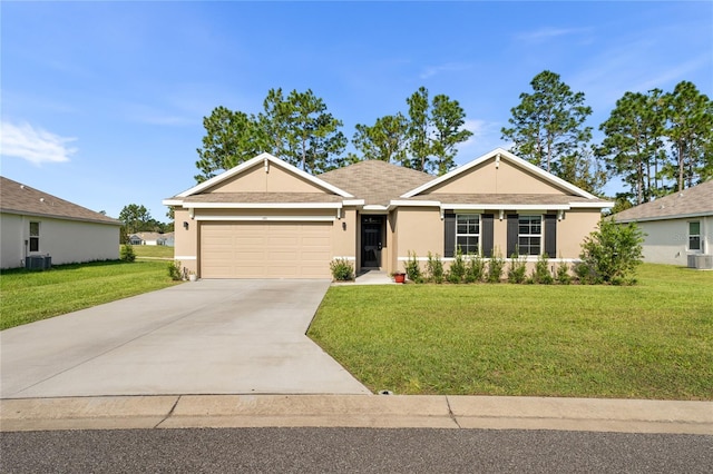 single story home with central AC, a garage, and a front yard