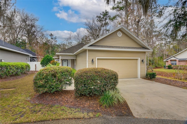 single story home featuring a garage