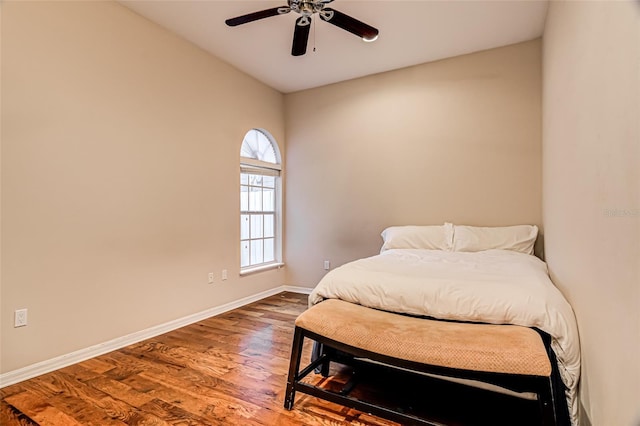 bedroom featuring hardwood / wood-style flooring and ceiling fan