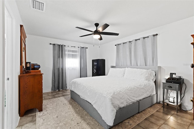 bedroom featuring ceiling fan