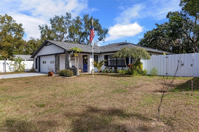 single story home with a garage and a front lawn