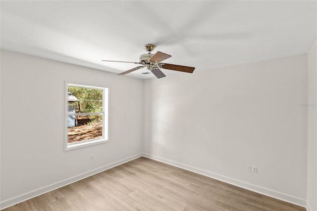 unfurnished room with ceiling fan and light wood-type flooring