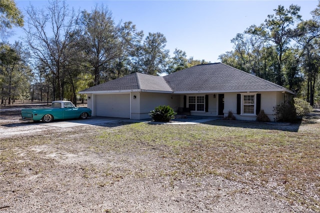 ranch-style home with a garage