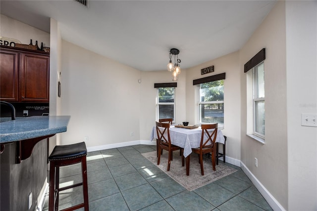 view of tiled dining space