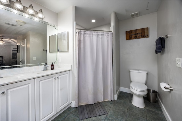 bathroom with toilet, a shower with curtain, vanity, ceiling fan, and tile patterned flooring