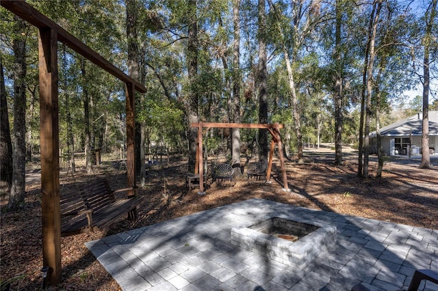 exterior space with an outdoor fire pit