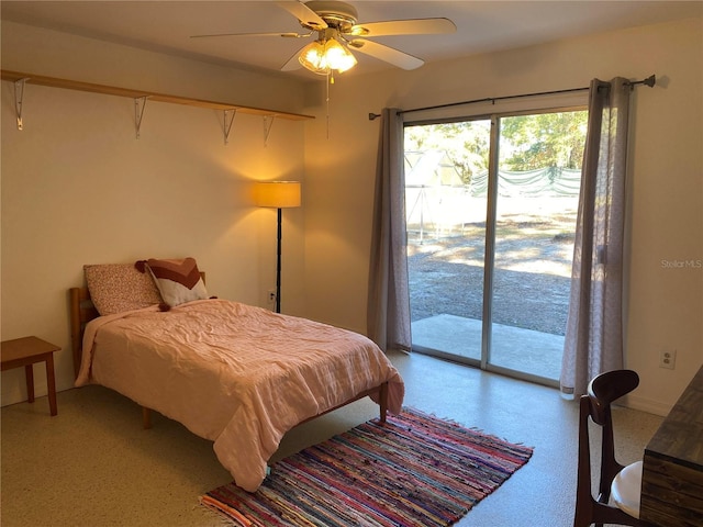 bedroom with ceiling fan and access to exterior