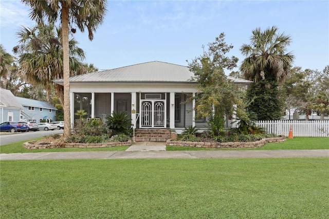 view of front facade with a front lawn