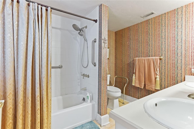 full bathroom with vanity, shower / bathtub combination with curtain, and toilet