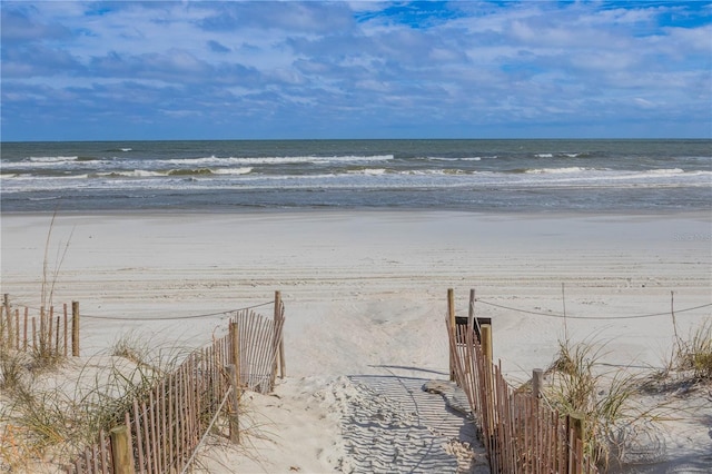 property view of water featuring a view of the beach