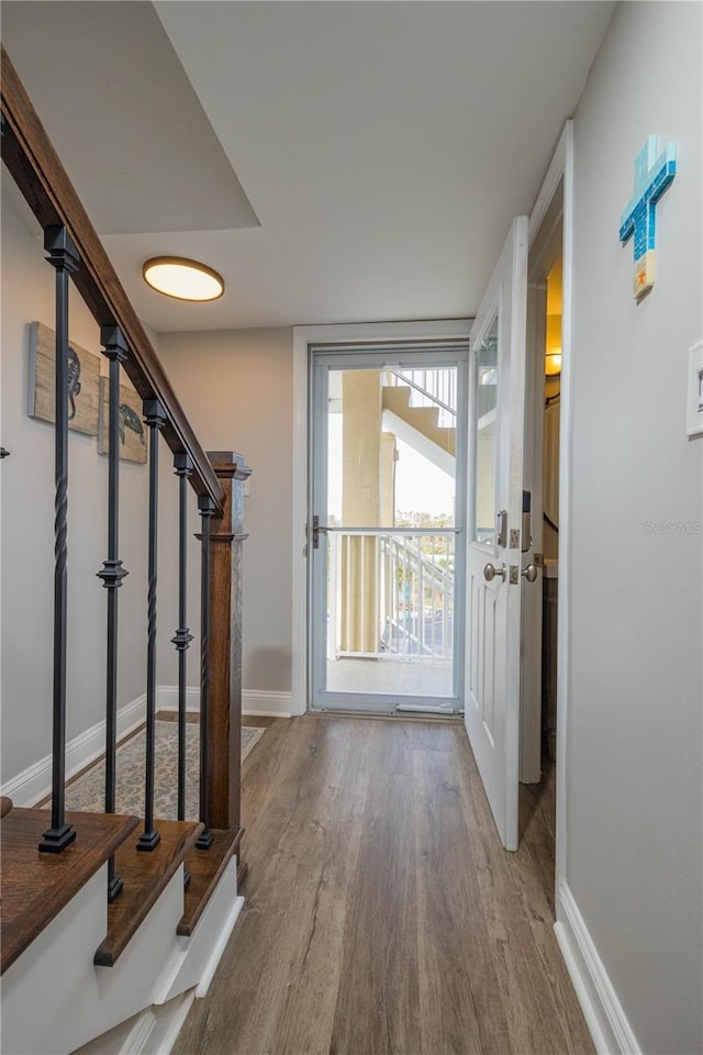 doorway to outside featuring hardwood / wood-style flooring