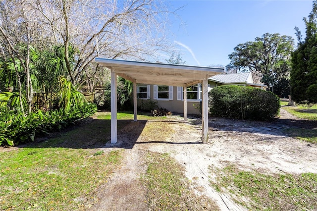 view of yard featuring a carport