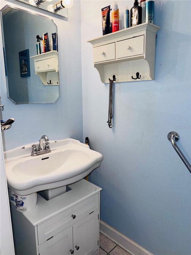 bathroom with vanity and tile patterned floors