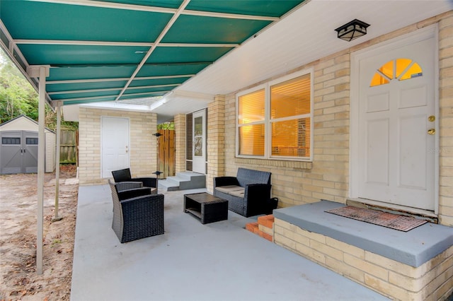 view of patio / terrace with a storage shed and an outdoor living space