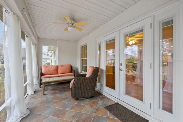 sunroom / solarium with ceiling fan