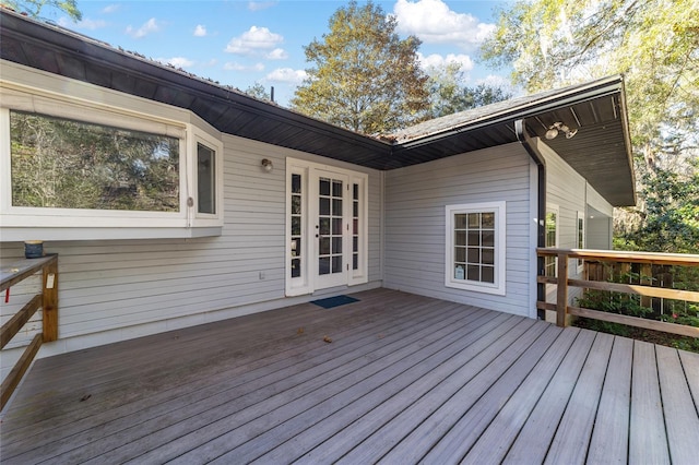 wooden terrace featuring french doors