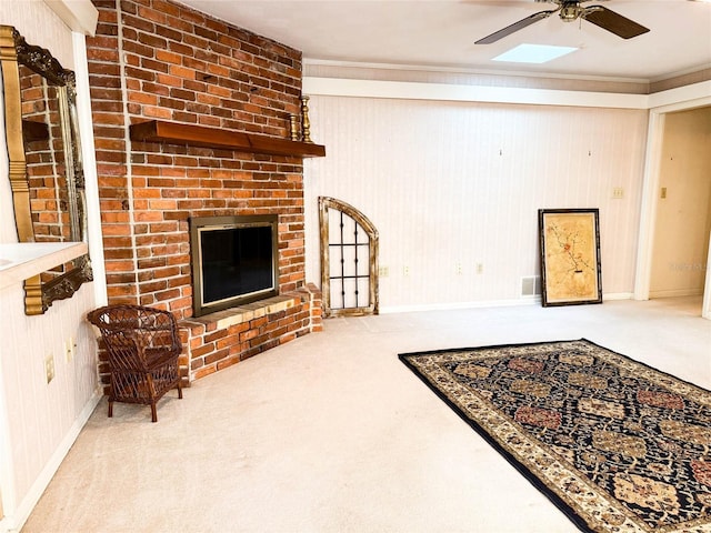 unfurnished living room featuring ceiling fan, baseboards, and carpet flooring