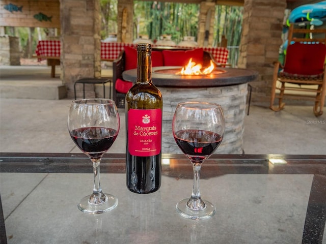 view of patio with a fire pit