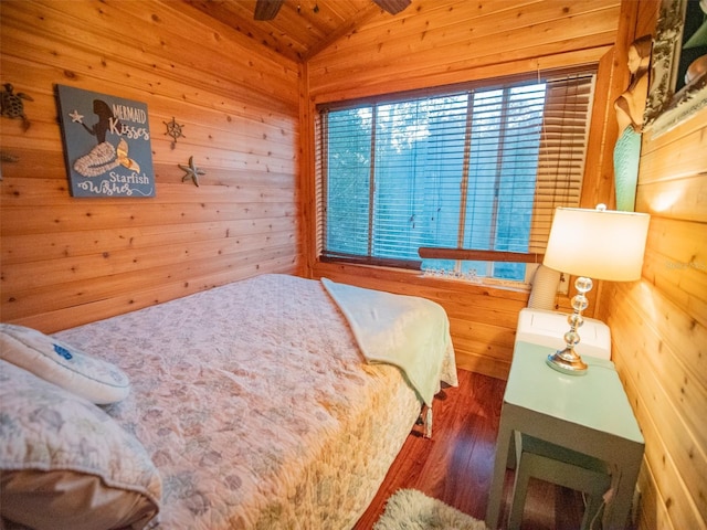 bedroom with wooden ceiling, dark hardwood / wood-style floors, wood walls, and vaulted ceiling