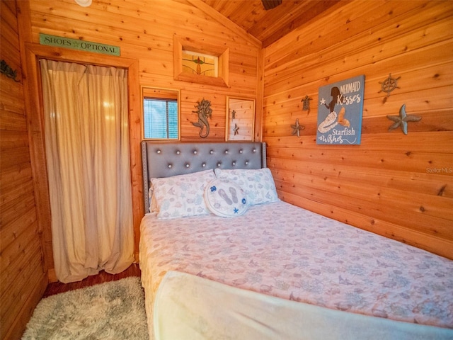 bedroom with wood ceiling and vaulted ceiling