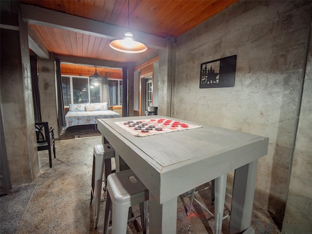 dining space with wood ceiling