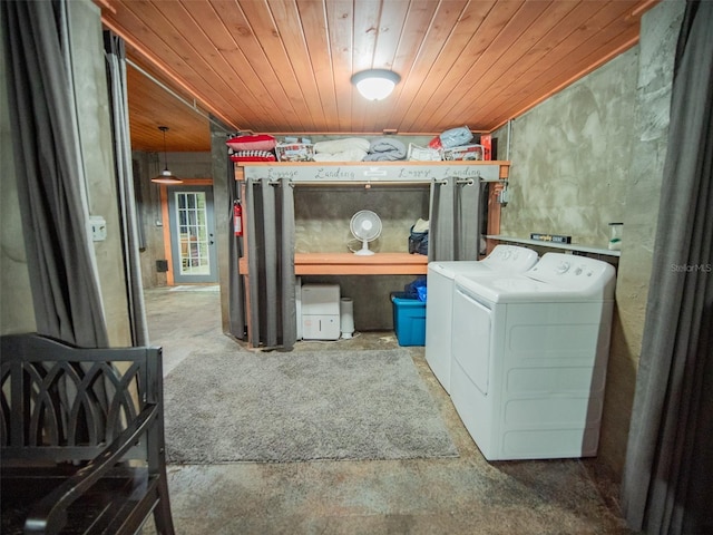 washroom with wooden ceiling and separate washer and dryer