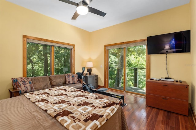 bedroom with ceiling fan, access to exterior, and dark hardwood / wood-style flooring