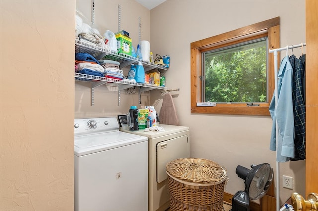 laundry room featuring separate washer and dryer