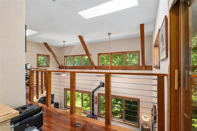 interior space featuring a healthy amount of sunlight and a skylight