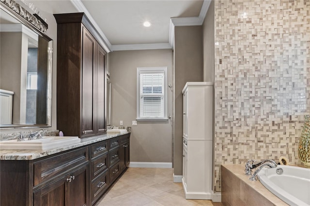 bathroom with tile patterned flooring, ornamental molding, a relaxing tiled tub, and vanity